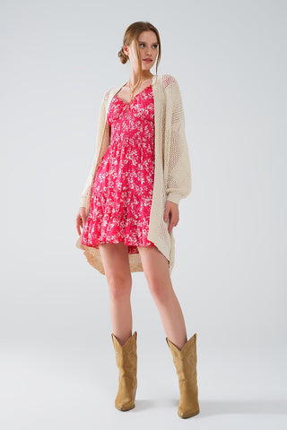 Cardigan drapé beige avec motif crocheté