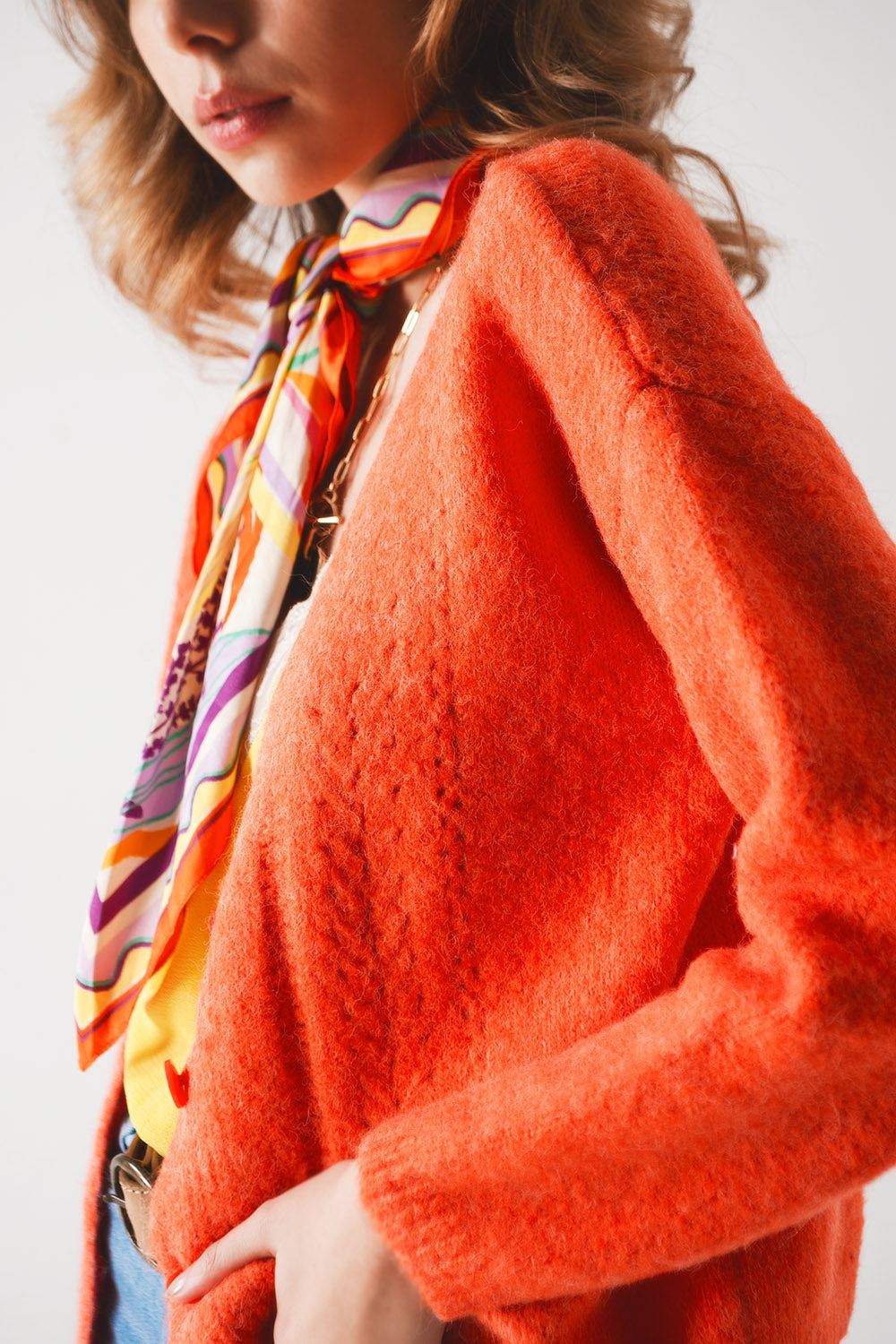 Button down cardigan in orange Q2 Sweaters BoutiqueLua