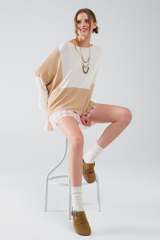 Pull à ailes de chauve-souris à blocs de couleurs en blanc et beige
