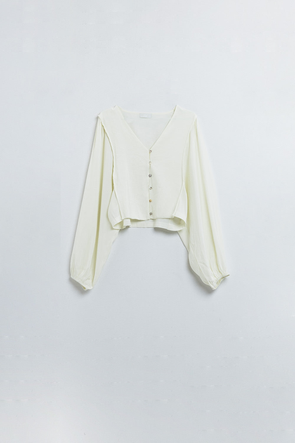 Cream blouse with balloon sleeves and frontal closure with buttons - Jumpers