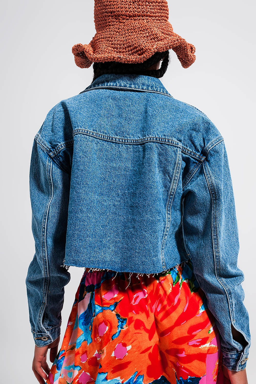 Cropped denim jacket with raw hem in mid wash Q2 Coats and Jackets BoutiqueLua