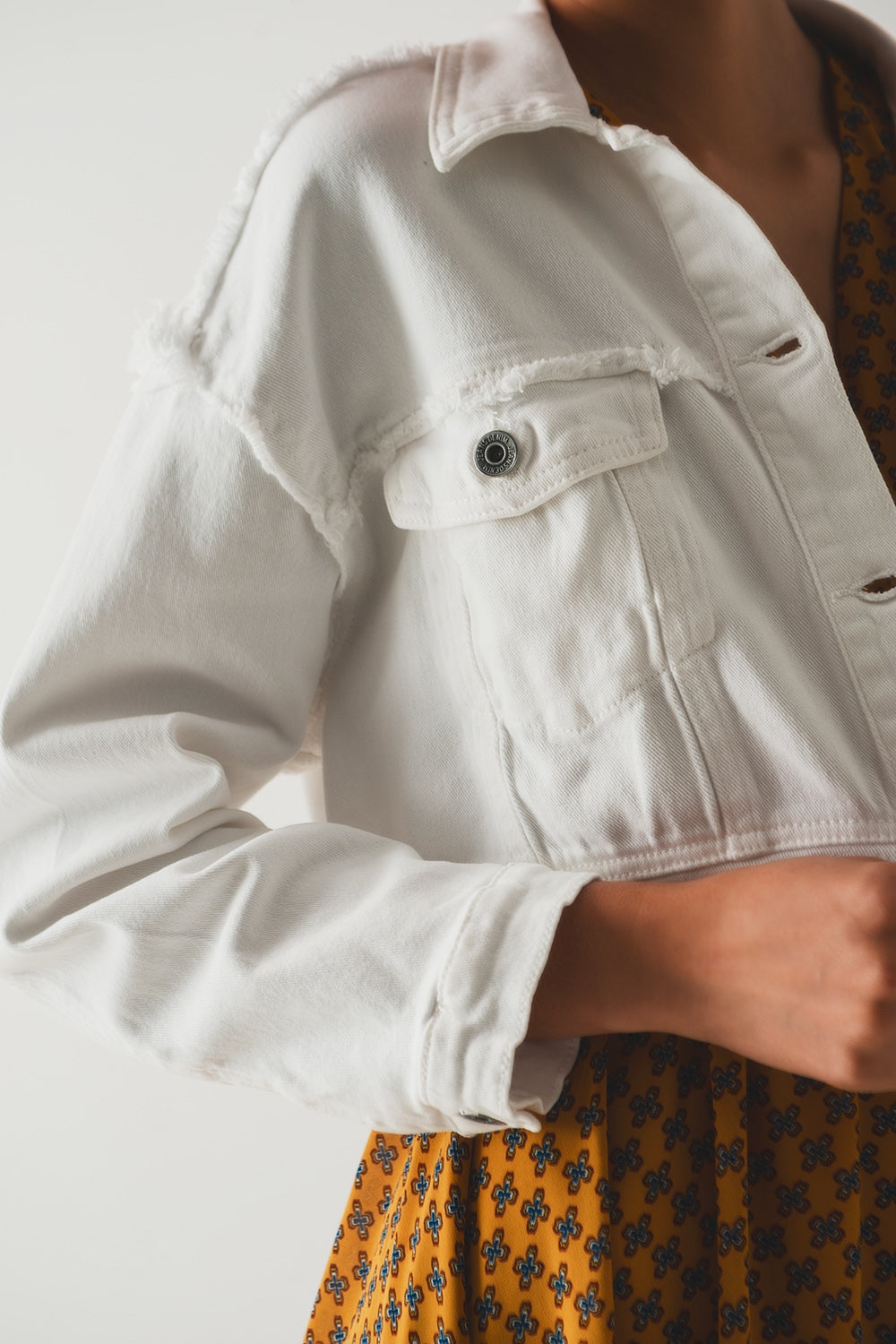 Cropped denim trucker jacket in white - Jackets