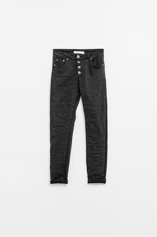 Exposed buttons skinny jeans in black