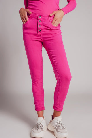 Jean skinny à boutons apparents fuchsia