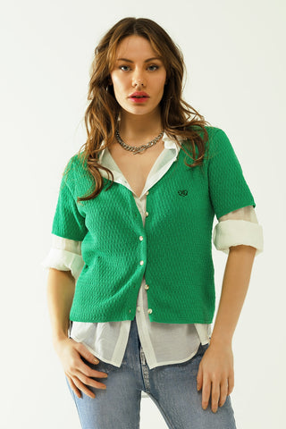Green cardigan with short sleeves and front closure with button