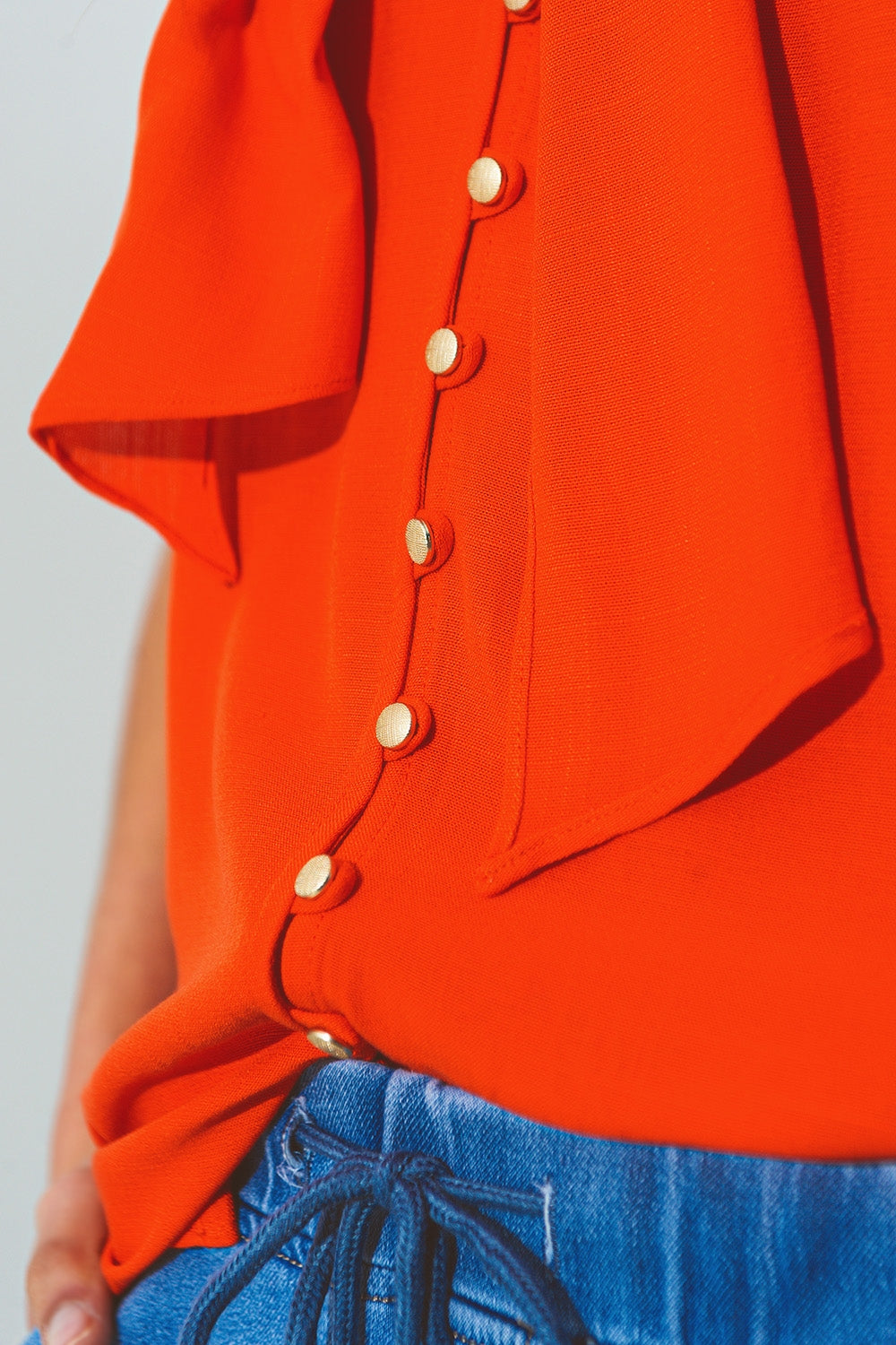 Halter Neck Top with Button Details in Orange Q2 Shirts BoutiqueLua