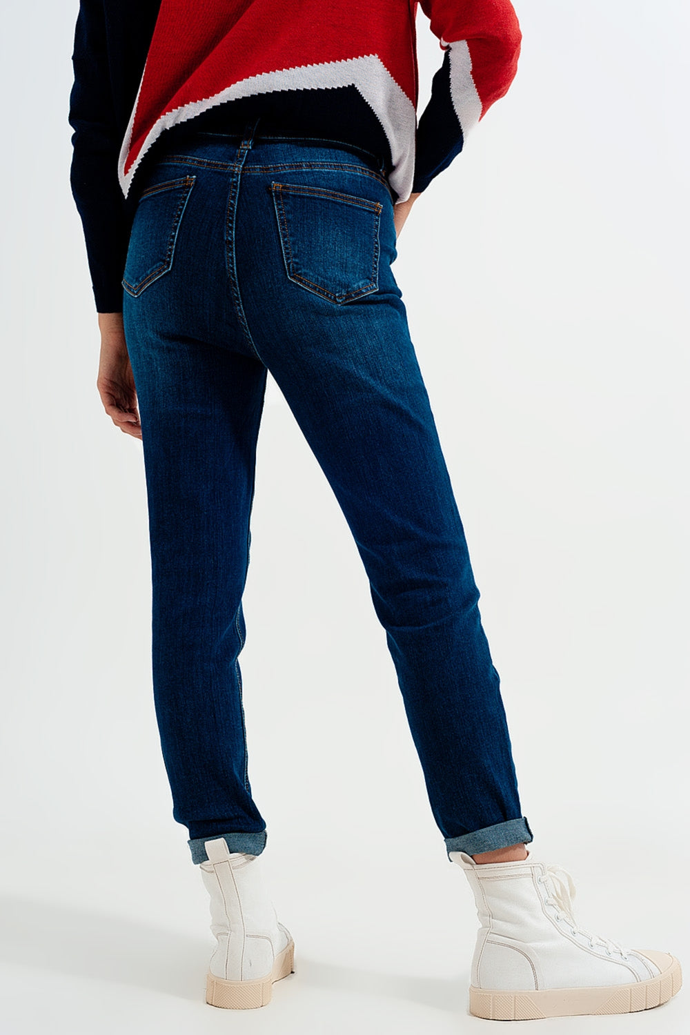 High rise jeans with exposed buttons in blue - Jeans