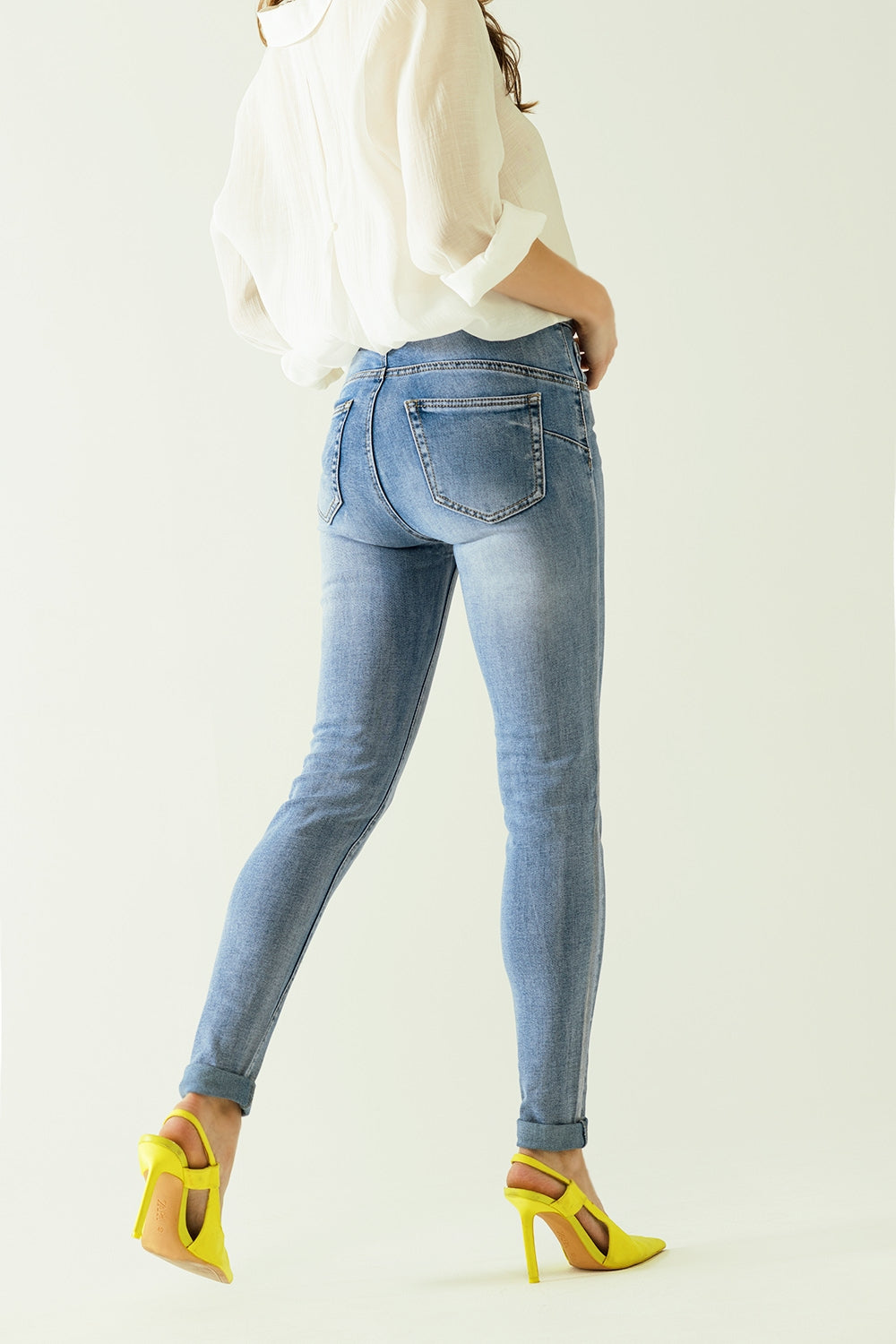 High-waisted jeans with five pockets with silver powder-coated effect - Jeans