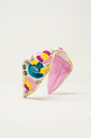 Bandeau noué avec fleurs décoratives couleur crème