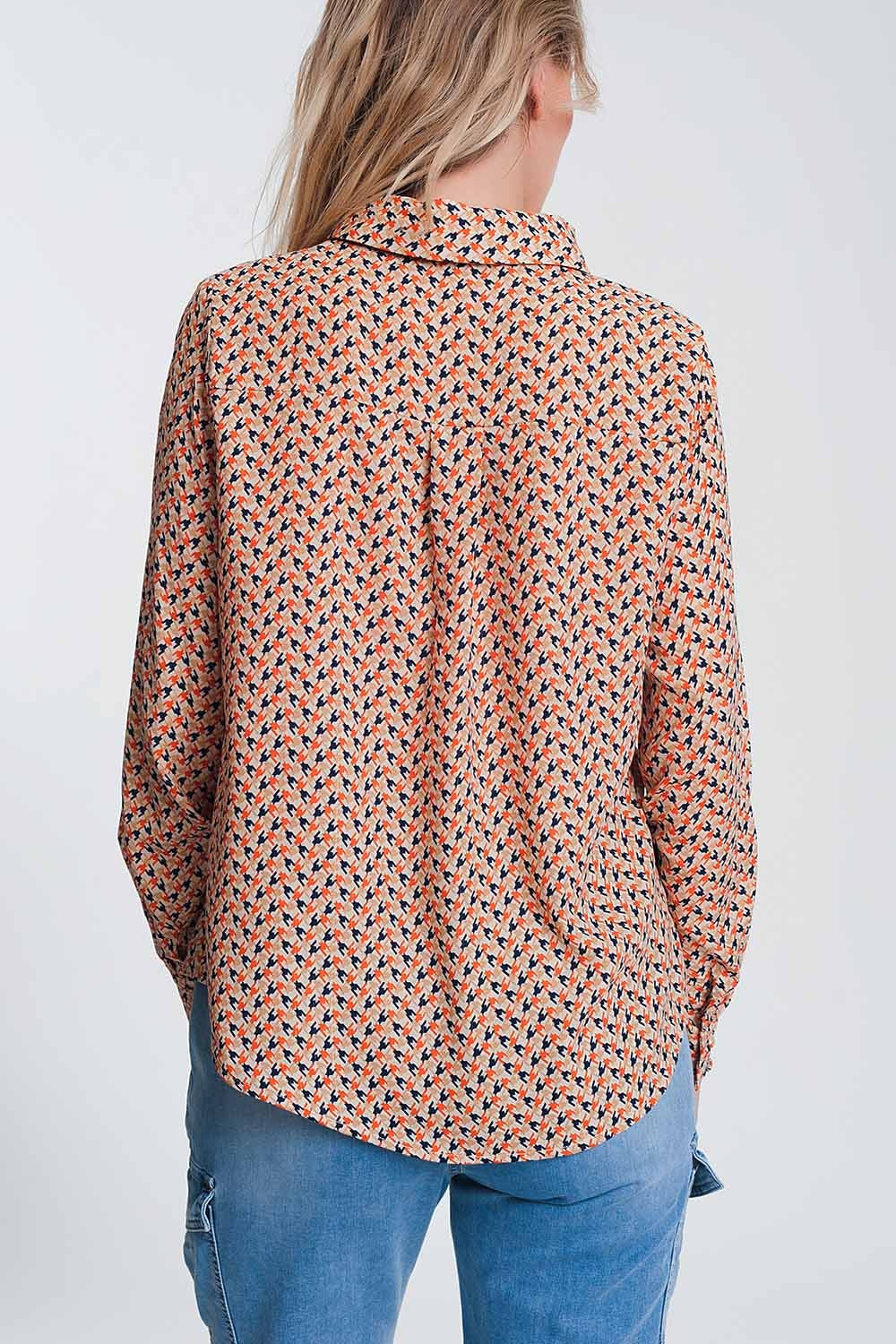Long sleeve blouse with ruffle detail in beige - Blouses