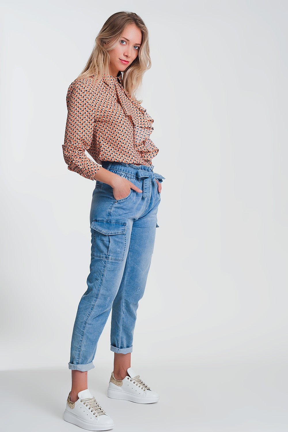 Long sleeve blouse with ruffle detail in beige - Blouses