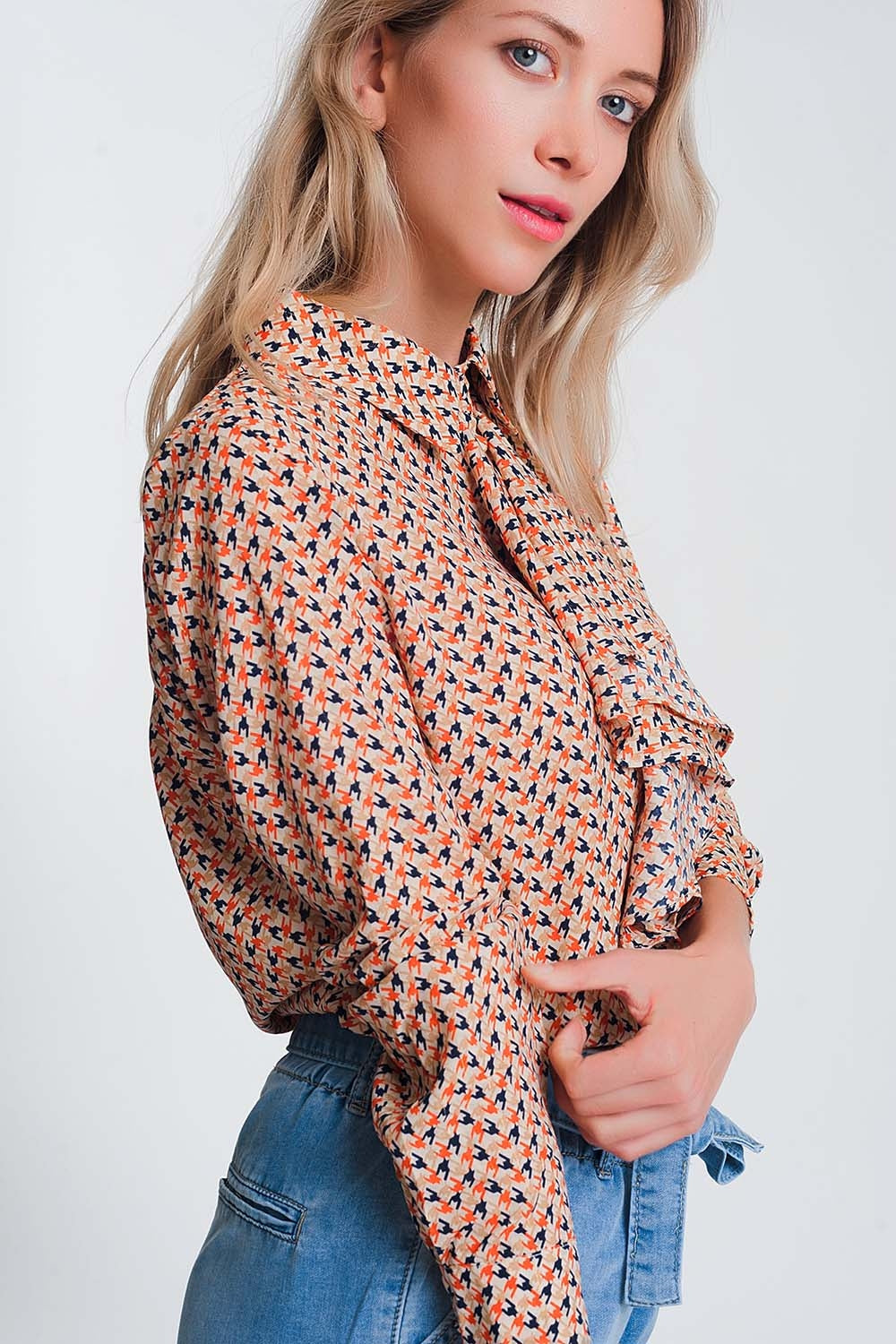 Long sleeve blouse with ruffle detail in beige - Blouses