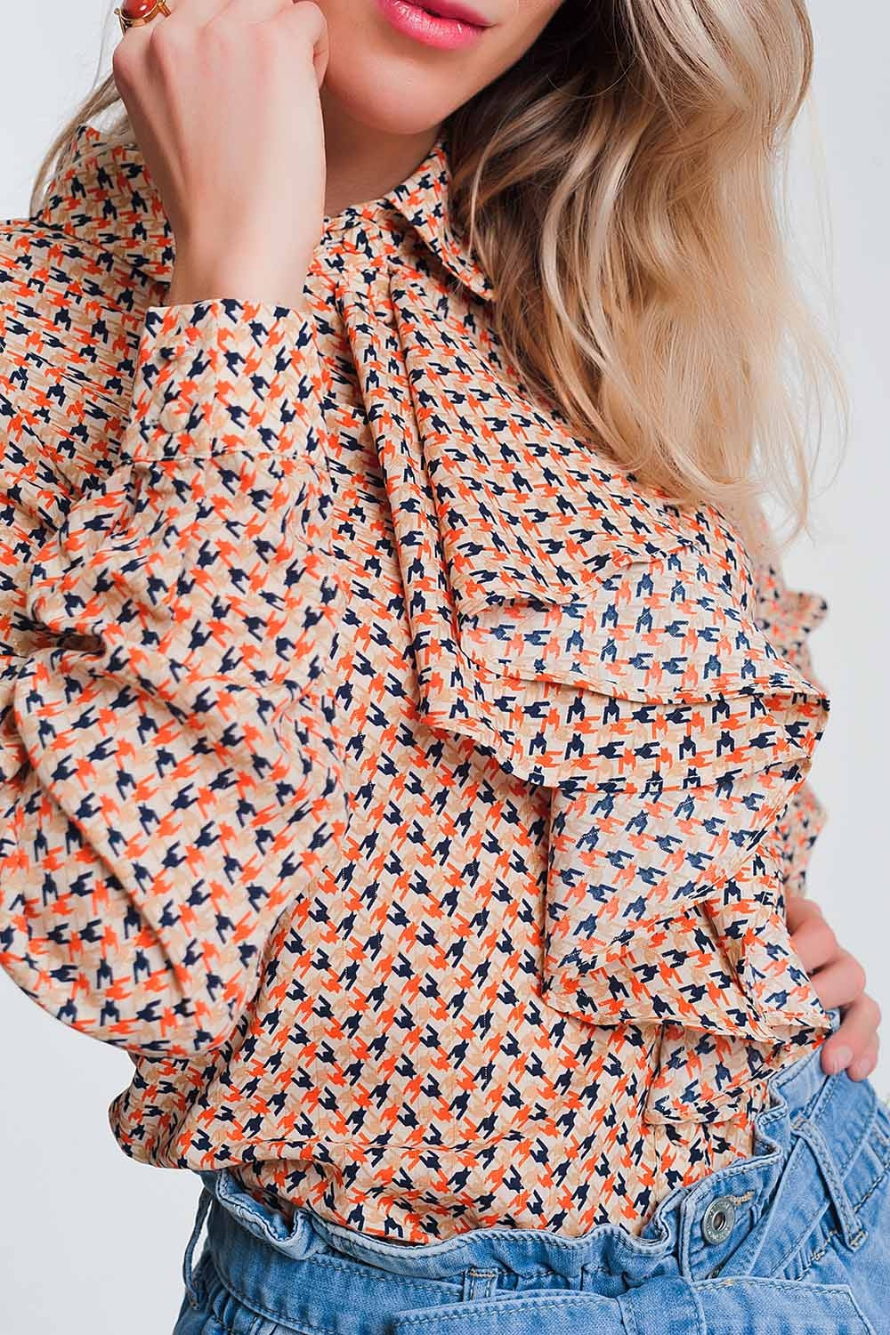 Long sleeve blouse with ruffle detail in beige - Blouses