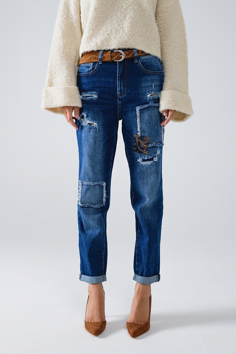 Loose blue jeans with subtle ripped design and patches - Jeans