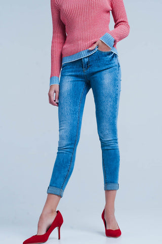 Medium wash skinny jeans with leopard print
