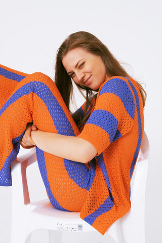 Cardigan tricoté au crochet à rayures orange