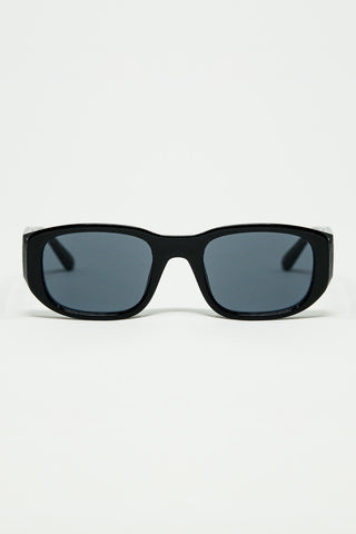 Oval Sunglasses with High Gloss Transparent Frames in black
