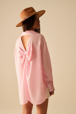 oversized baby pink shirt with bow in the back
