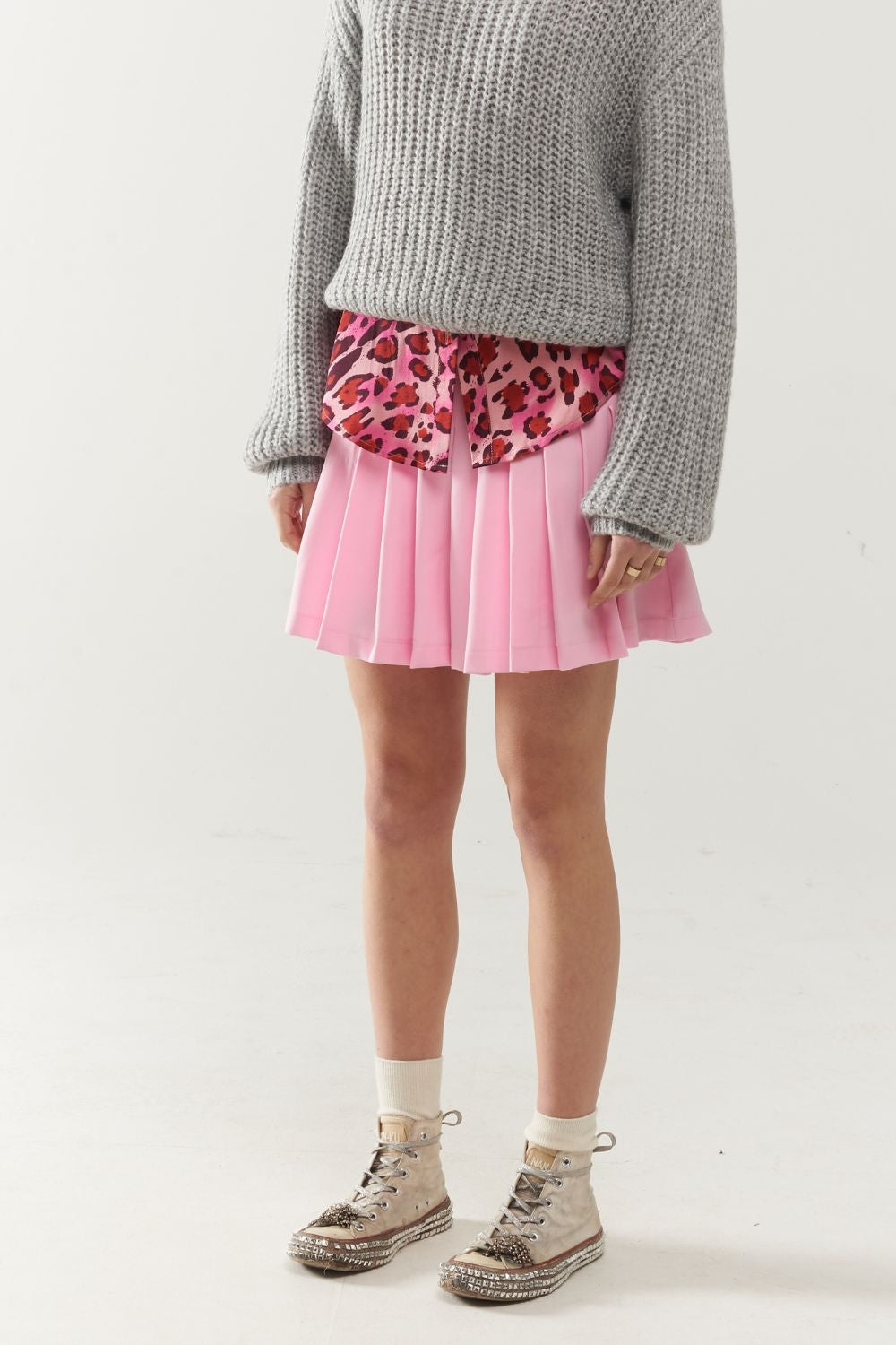 pink pleated mini skirt