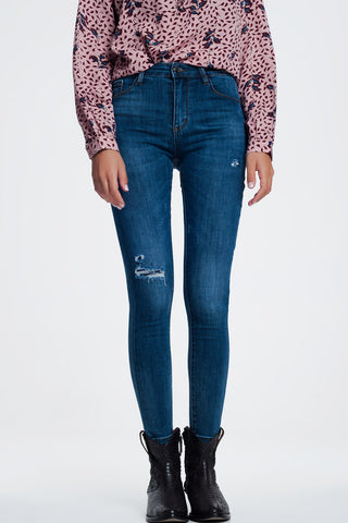 Ripped skinny jeans in blue denim