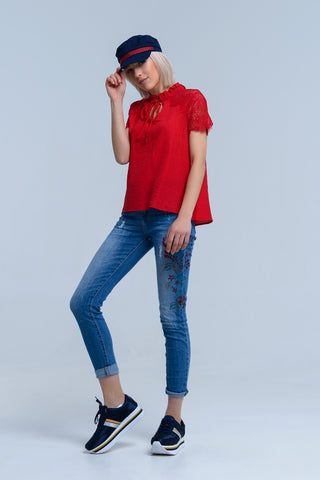 Jean skinny avec motif floral peint