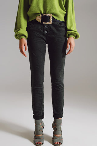 Jean skinny avec boutons apparents en vert militaire