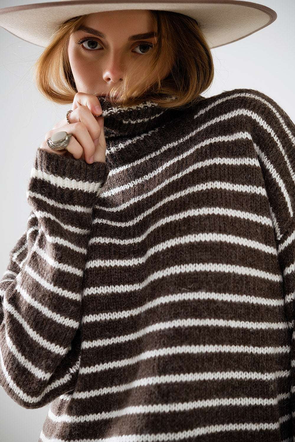 soft knit striped turtleneck sweater in brown