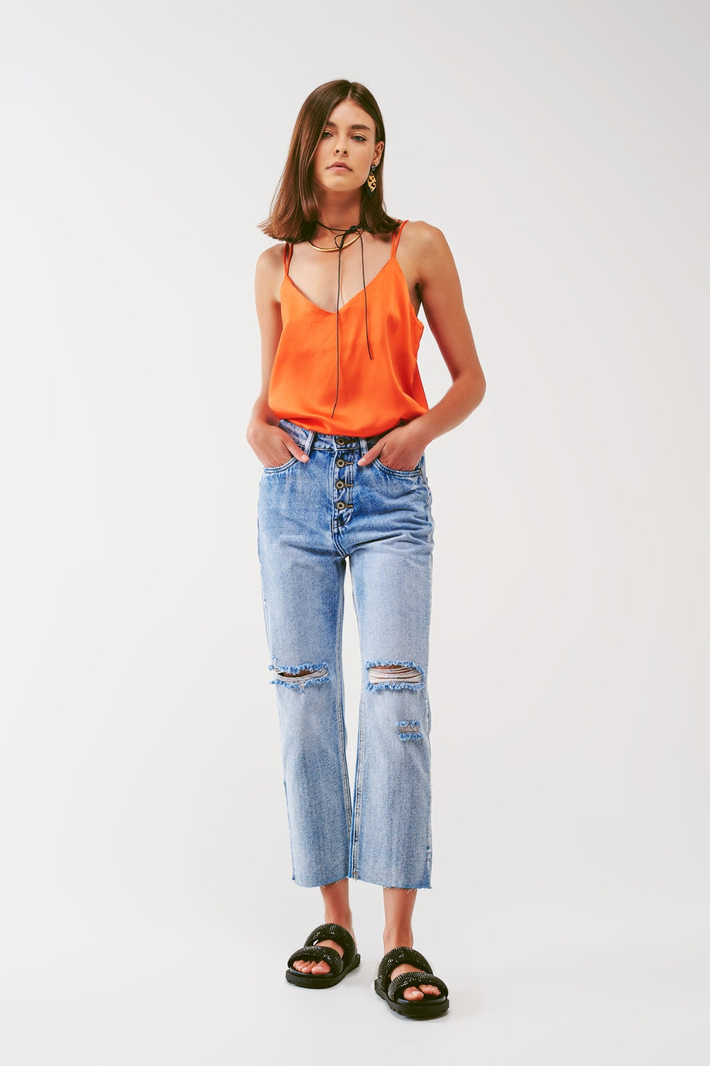 Sraight-leg jeans with exposed buttons and ripped knees in light wash - Jeans