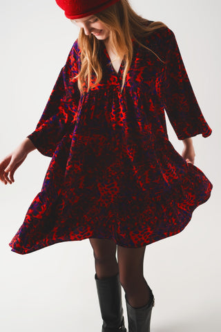 Tiered mini smock dress in animal print in red