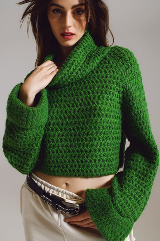Pull en tricot gaufré avec col roulé et poignets roulés en vert