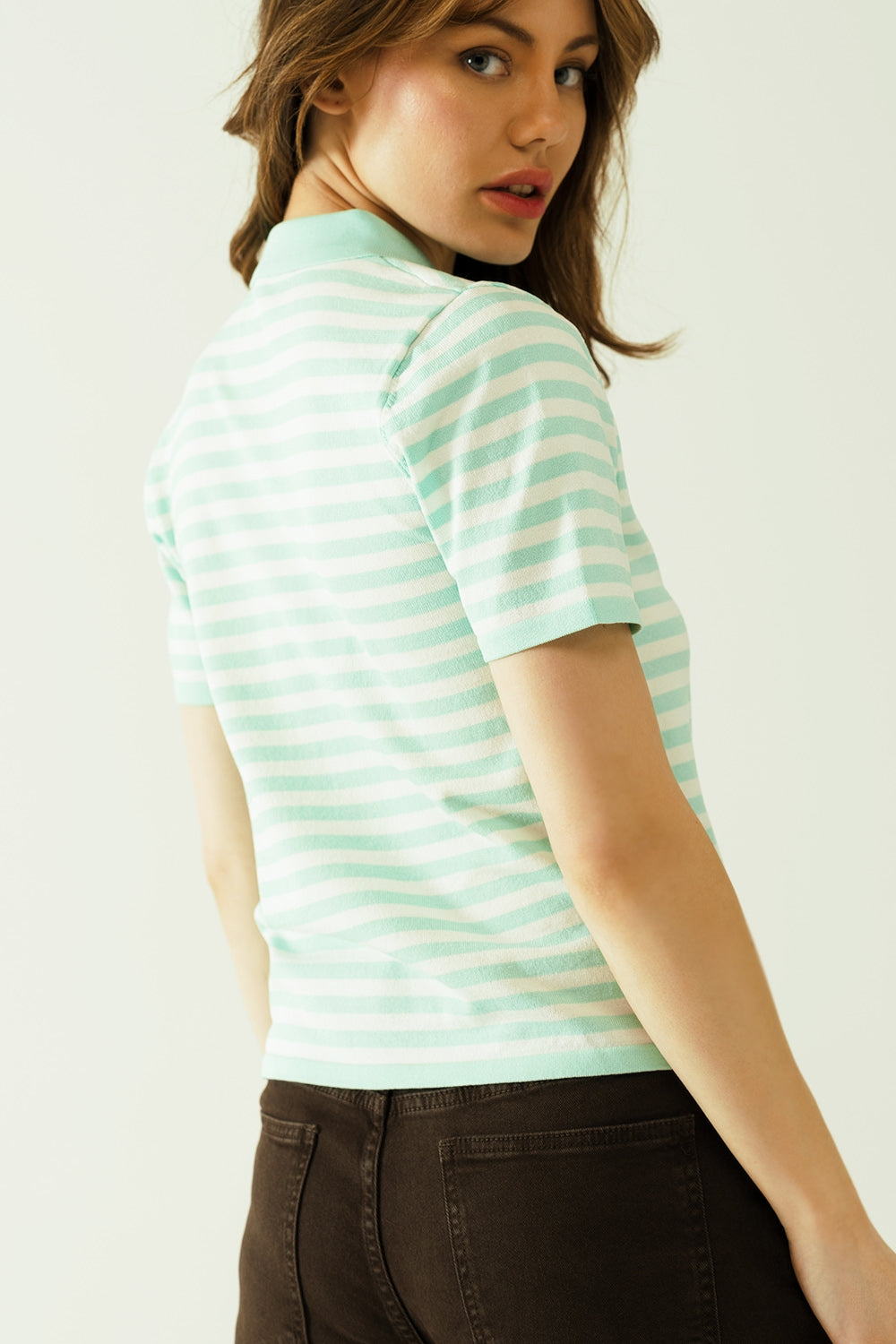 White short sleeves polo shirt with light blue stripes and frontal buttons details Q2 Sweaters BoutiqueLua