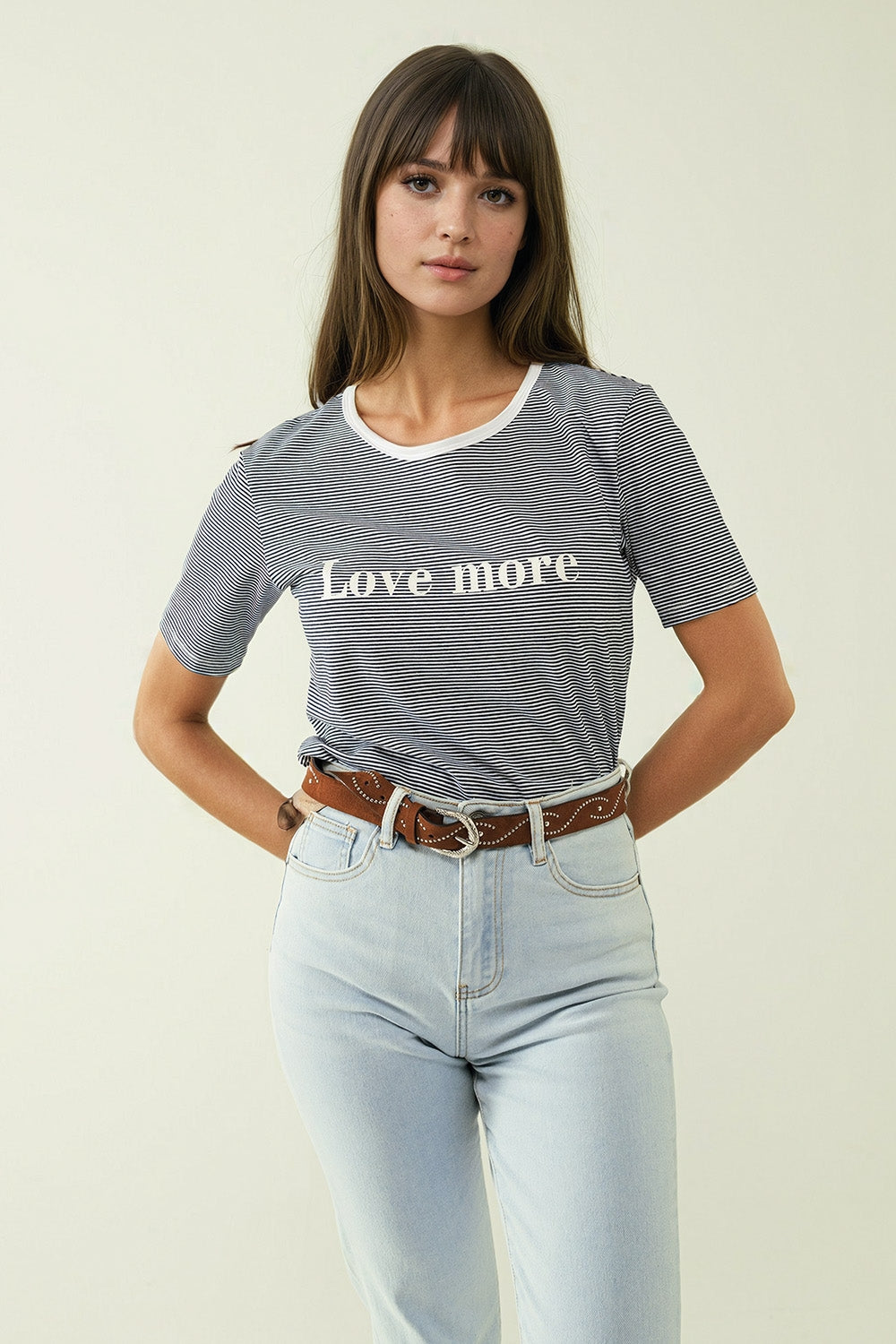 White T-shirt with black stripes and Love More texted - T-Shirts