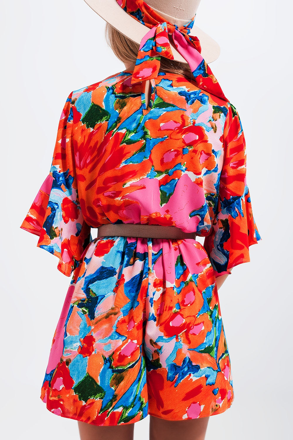 Wrap playsuit in floral Q2 Dresses BoutiqueLua