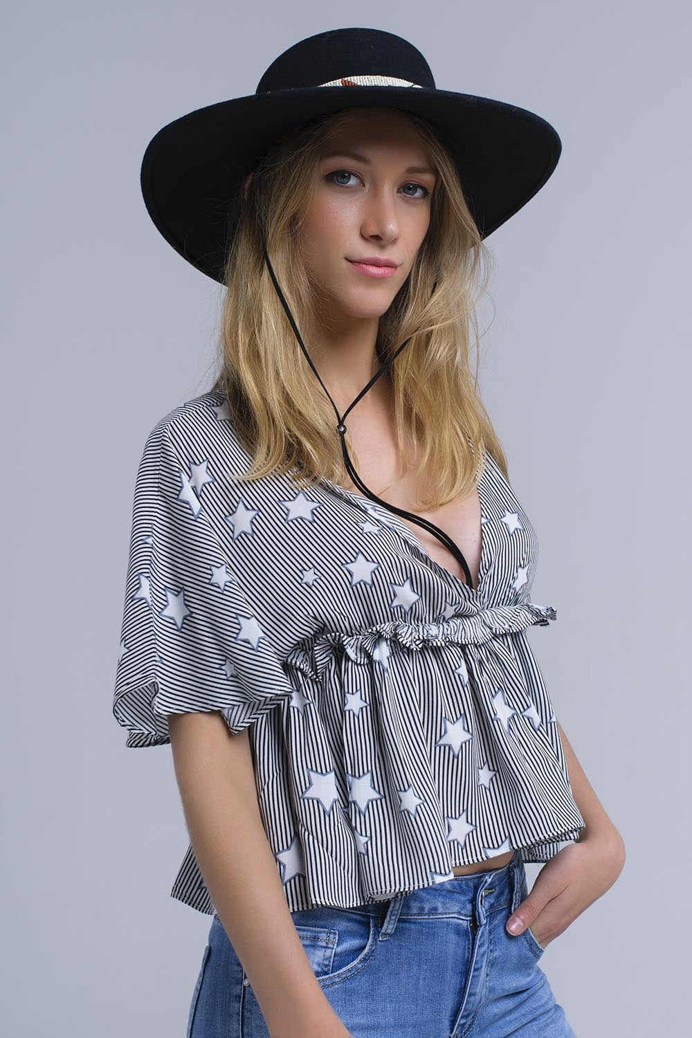 Black top with stars and ruffle - Tops