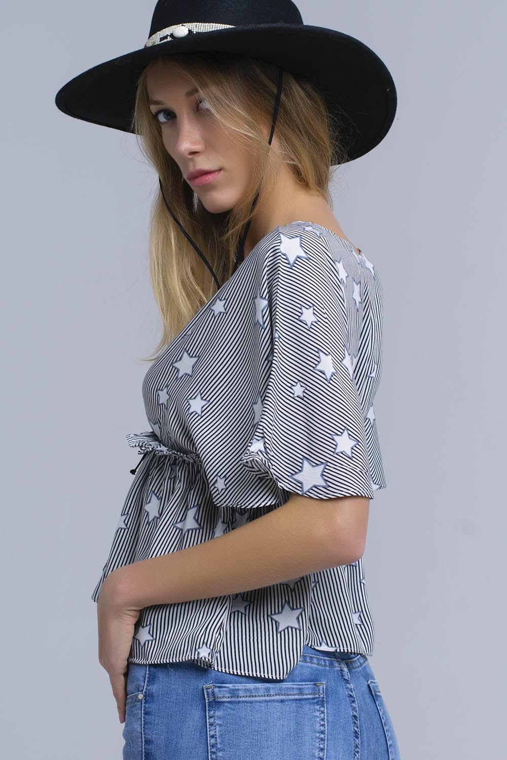 Black top with stars and ruffle - Tops