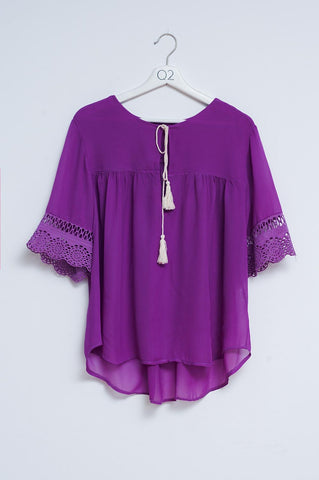 Blusa bordada amarrada na frente em roxo