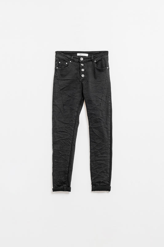 Exposed buttons skinny jeans in black - Pants