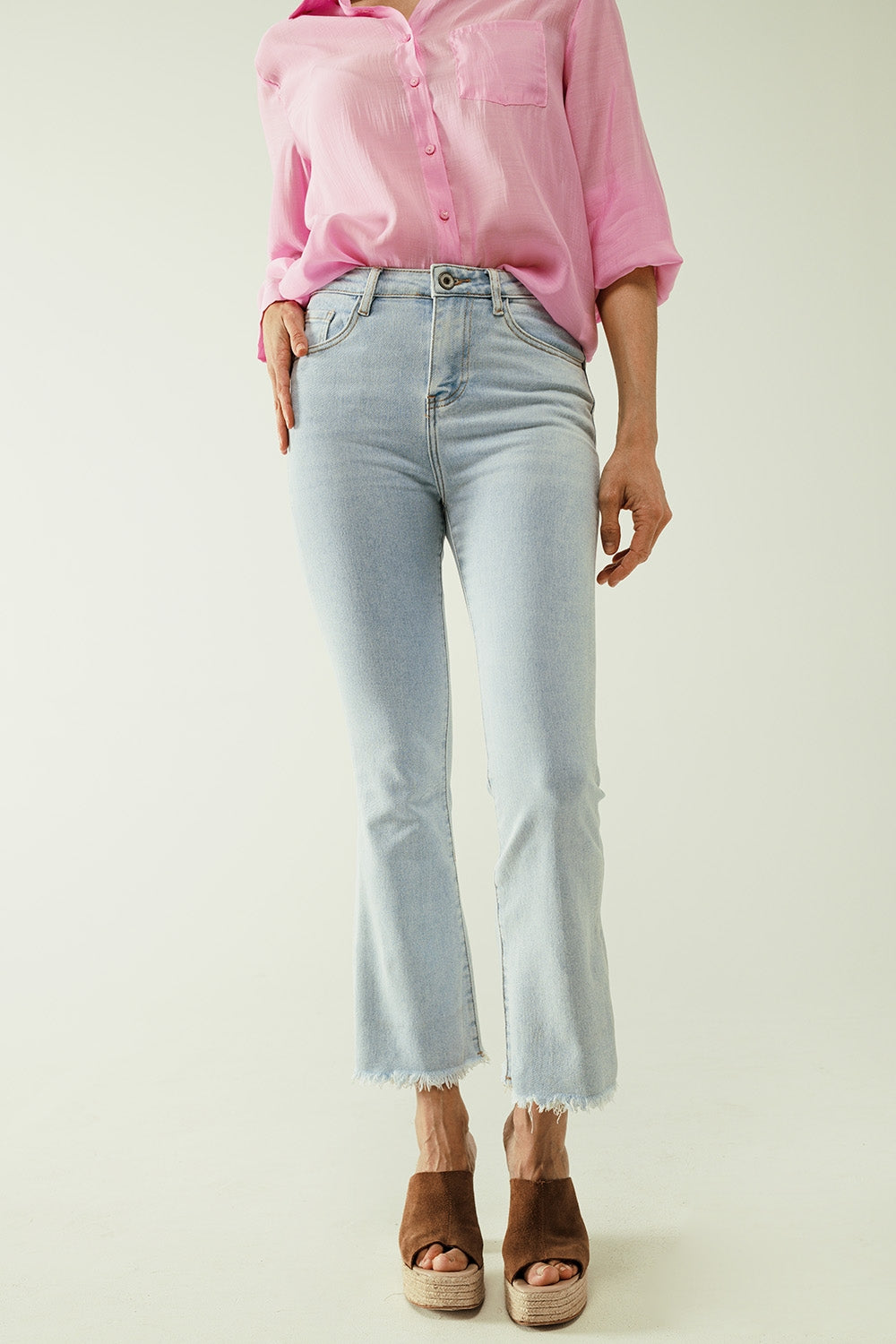 Flared light blue jeans with five pockets and seamless finish - Jeans