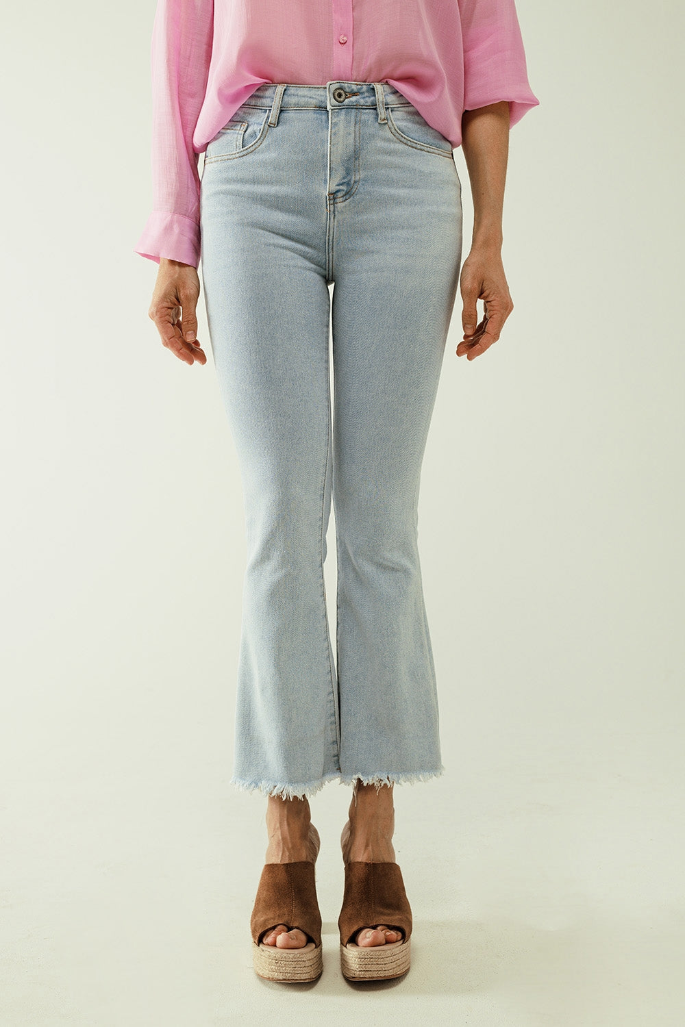 Flared light blue jeans with five pockets and seamless finish - Jeans
