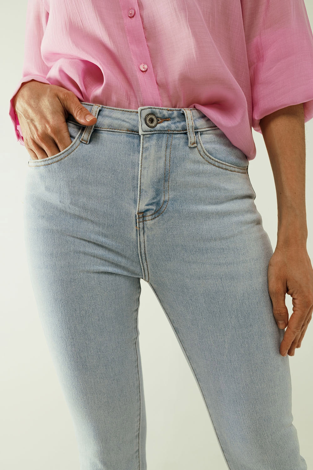 Flared light blue jeans with five pockets and seamless finish - Jeans
