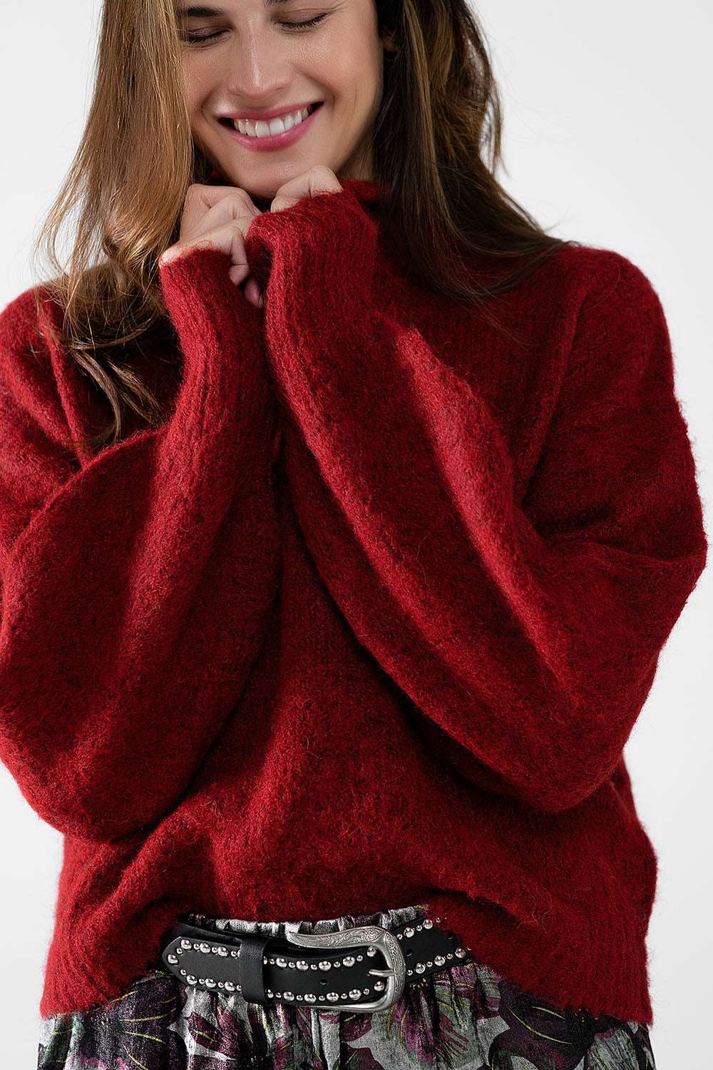 Fluffy red sweater with high neck and balloon sleeves