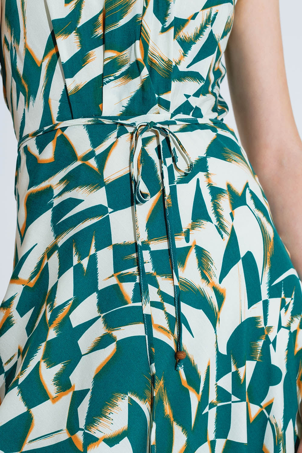 Halter Midi Dress with Cinched Waist In Abstract Green and White Print Q2 Dresses BoutiqueLua