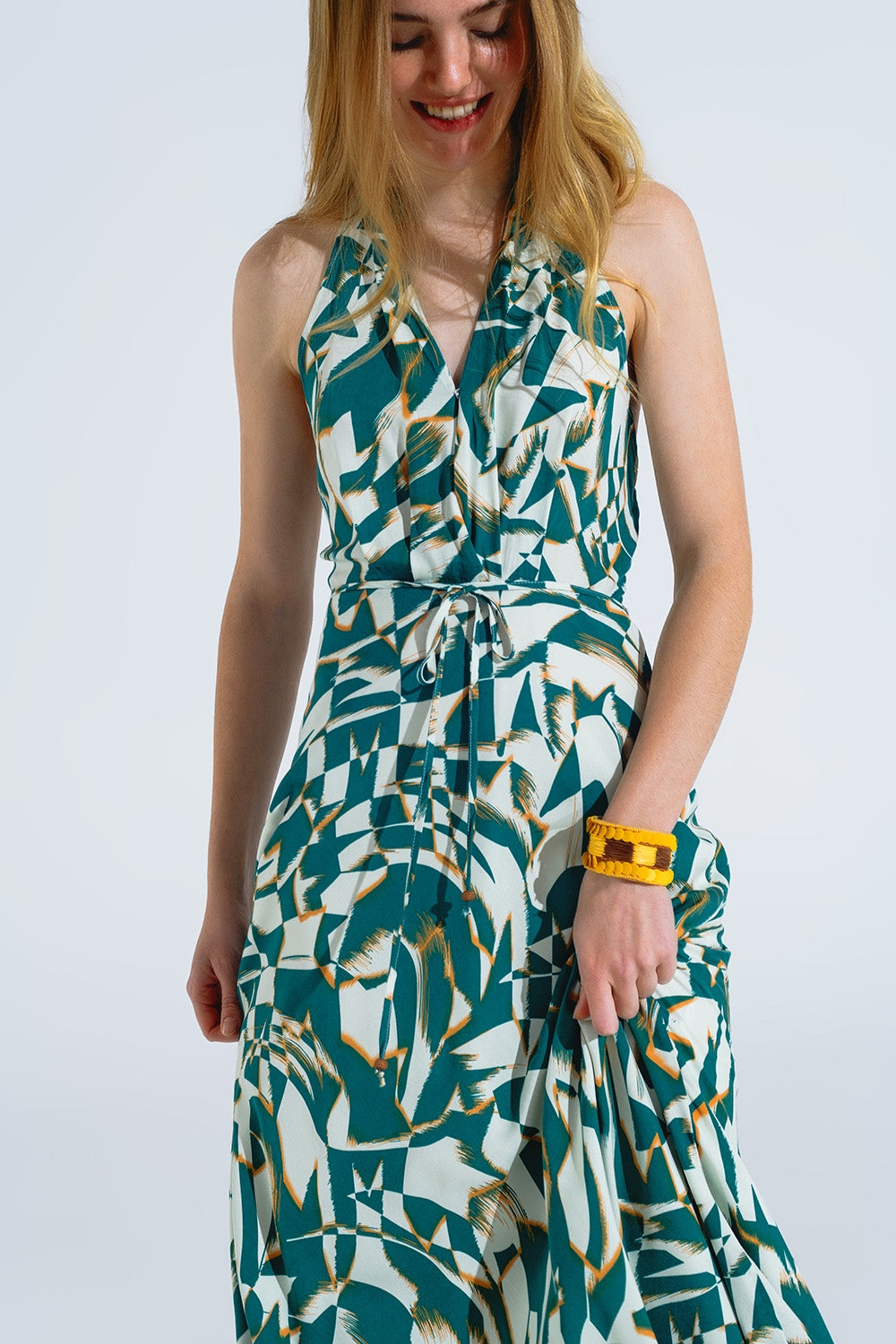 Halter Midi Dress with Cinched Waist In Abstract Green and White Print Q2 Dresses BoutiqueLua