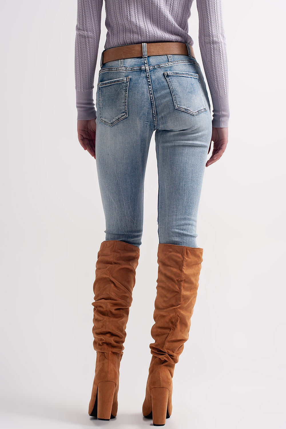 Heather skinny leg distressed jeans with button detail in light blue Q2 Jeans BoutiqueLua