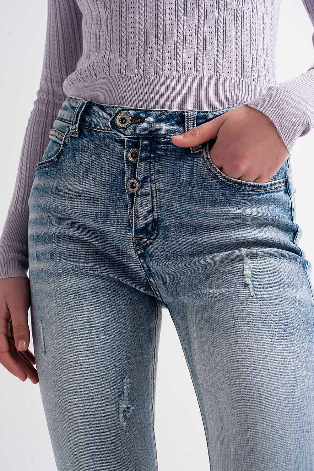 Heather skinny leg distressed jeans with button detail in light blue Q2 Jeans BoutiqueLua