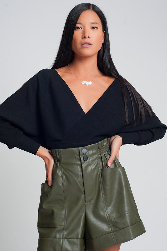 Knitted sweater with wrapped V-neck in black - Jumpers