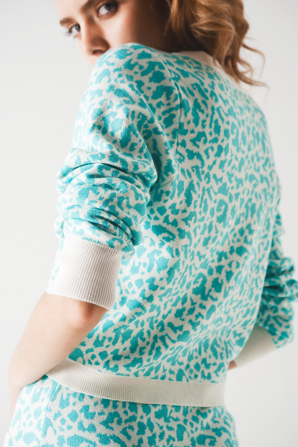 Lightweight knitted cardigan in turquoise animal print Q2 Sweaters BoutiqueLua