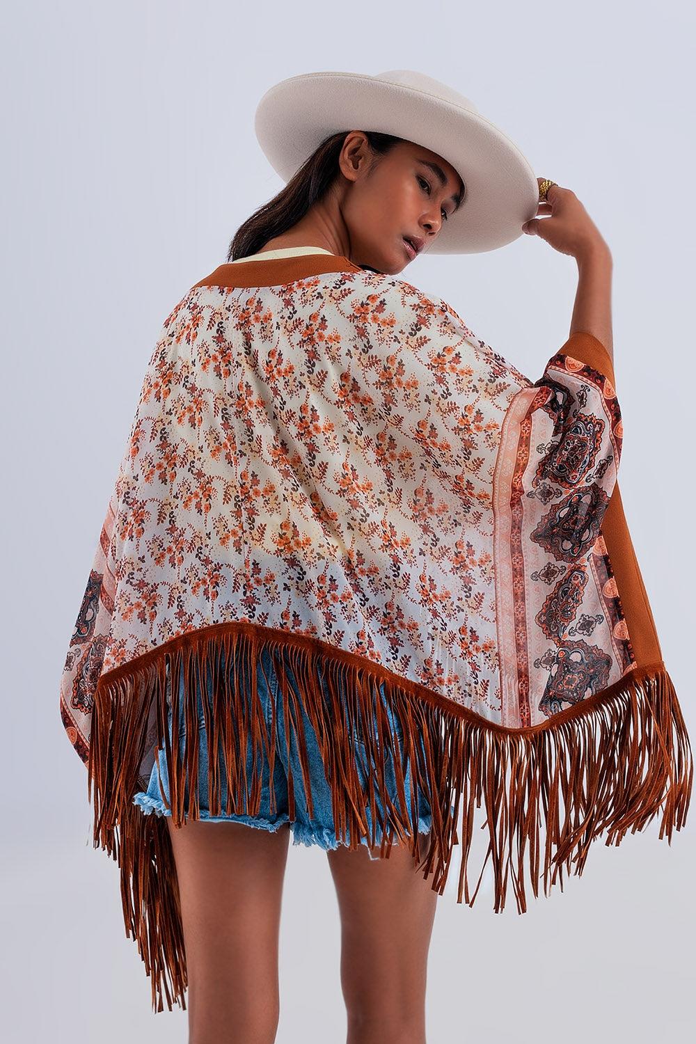 Printed kimono with fringe detail in brown - Kimonos
