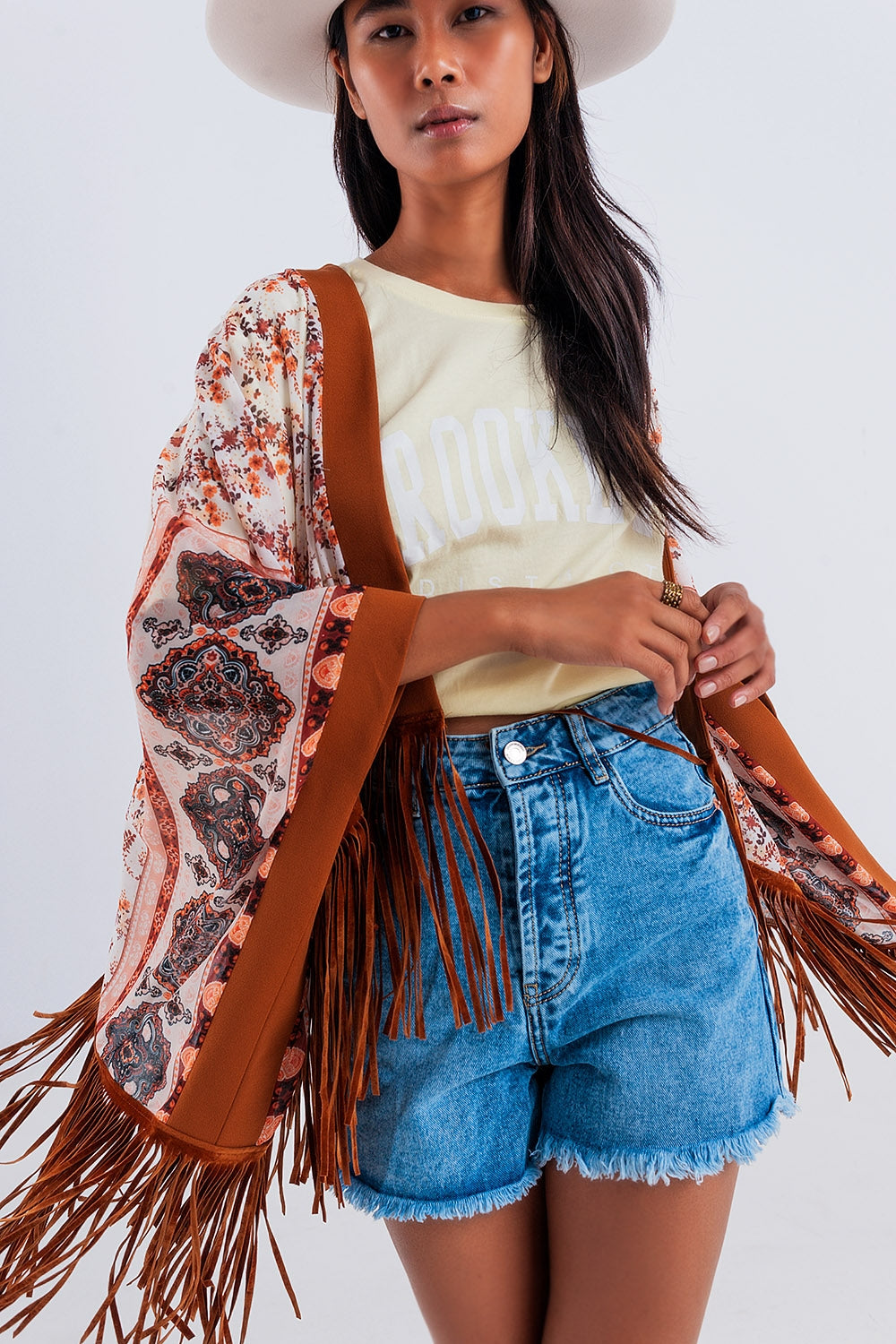 Printed kimono with fringe detail in brown - Kimonos