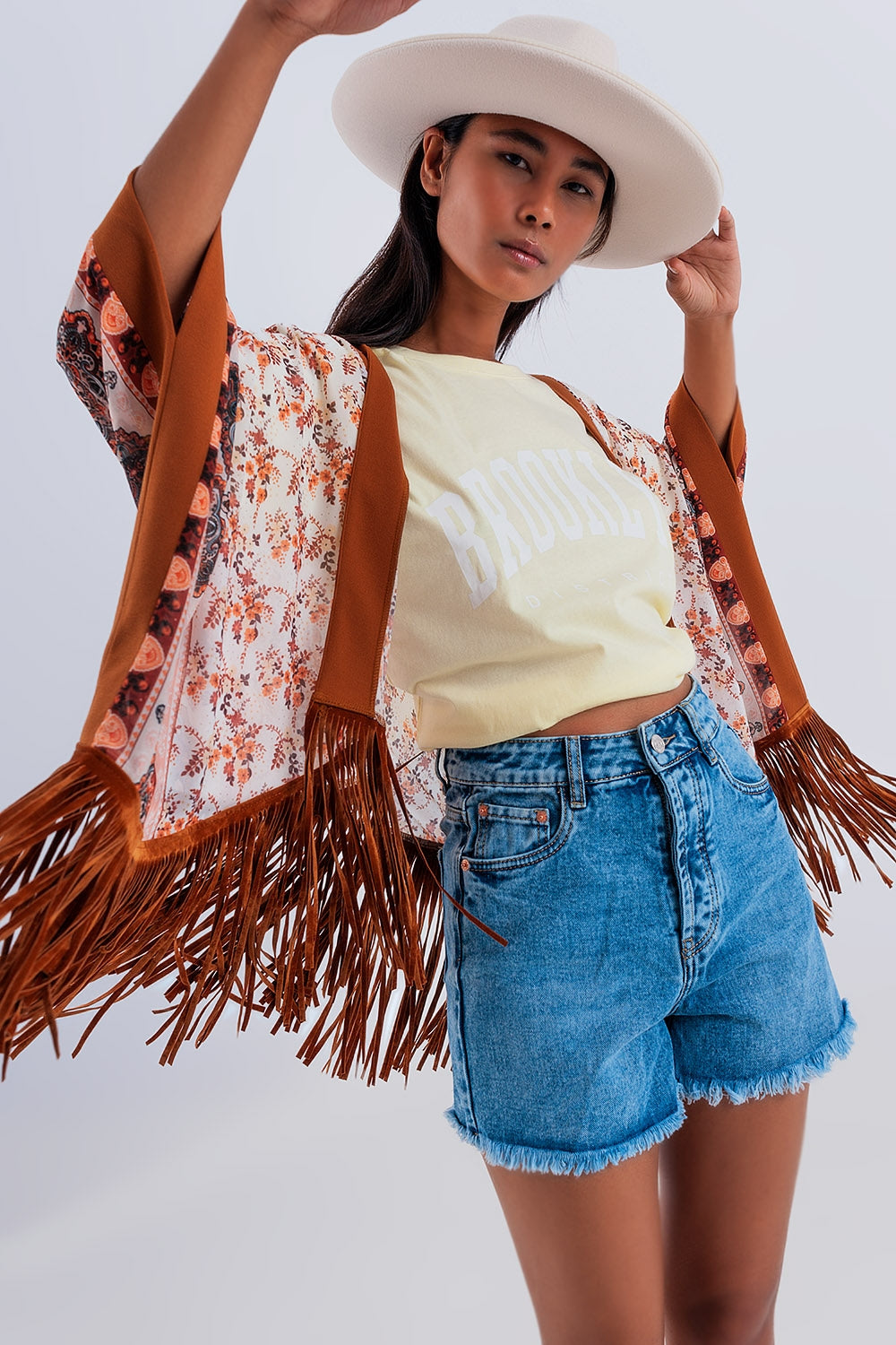 Printed kimono with fringe detail in brown - Kimonos